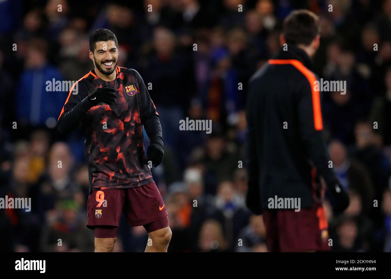Soccer Football - Champions League Round of 16 First Leg - Chelsea vs FC Barcelona - Stamford Bridge, London, Britain - February 20, 2018   Barcelona’s Luis Suarez and Lionel Messi warm up before the match    REUTERS/Eddie Keogh Stock Photo
