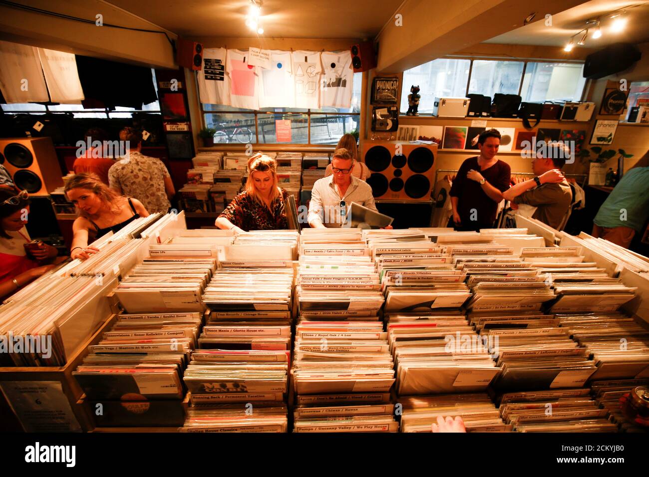 People browse records inside Phonica Records, during Record Store Day in  central London, Britain. April 21, 2018. REUTERS/Henry Nicholls Stock Photo  - Alamy