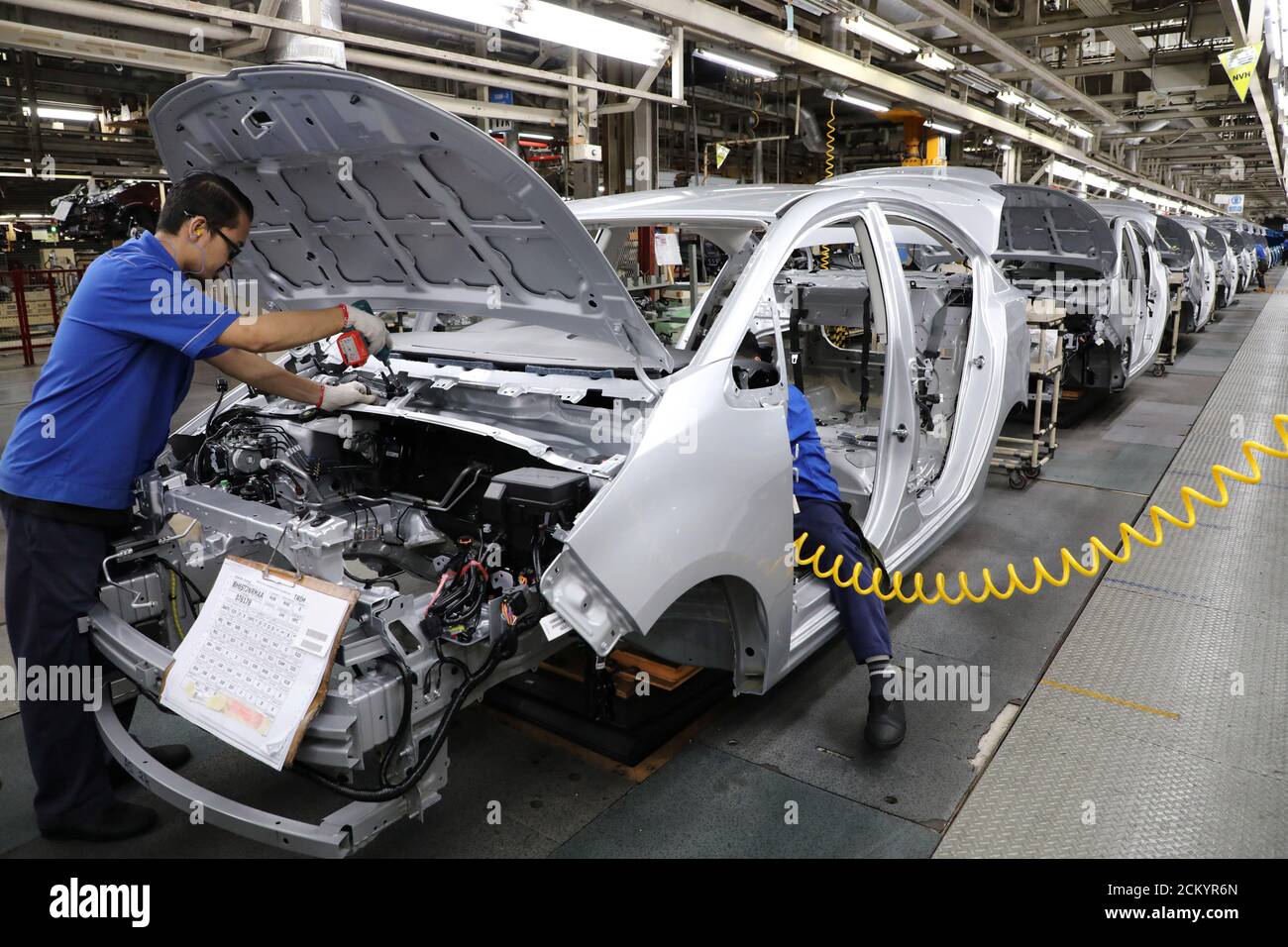 Employees Work At An Assembly Line In The Proton Manufacturing Plant In Tanjung Malim Malaysia December 16 2019 Picture Taken December 16 2019 Reuters Lim Huey Teng Stock Photo Alamy