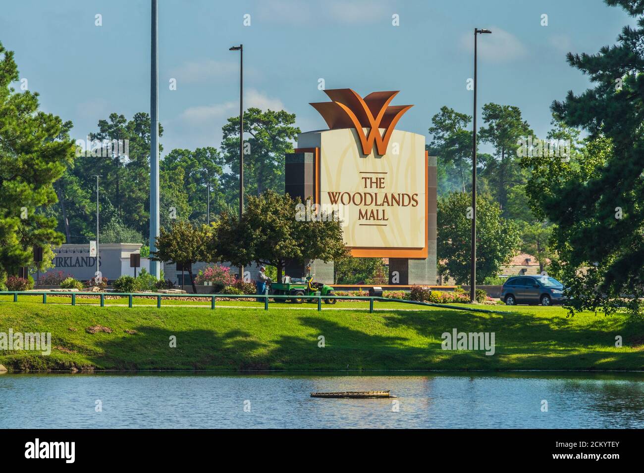 The Woodlands Mall sign and entrance at Lake Robbins on the Woodlands