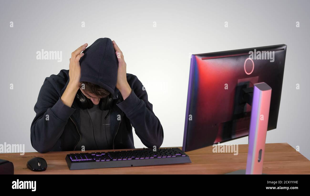 Stressed tired out of work, Development Programmer on gradient b Stock Photo