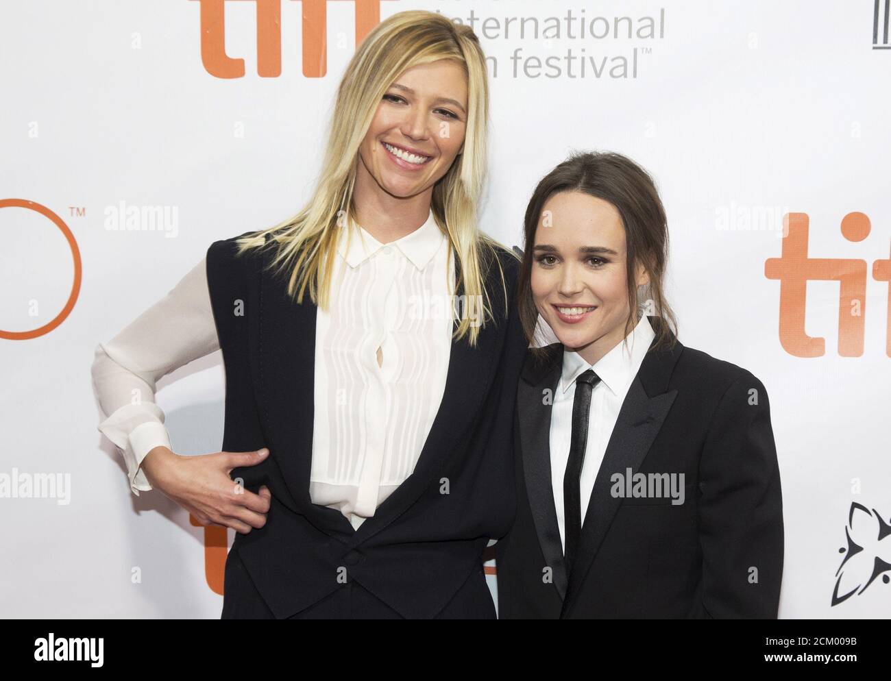 Actress Ellen Page arrives with her girlfriend, Samantha Thomas (L), on the red carpet for the film 'Freeheld' during the 40th Toronto International Film Festival in Toronto, Canada, September 13, 2015. TIFF runs from September 10-20. REUTERS/Mark Blinch Stock Photo