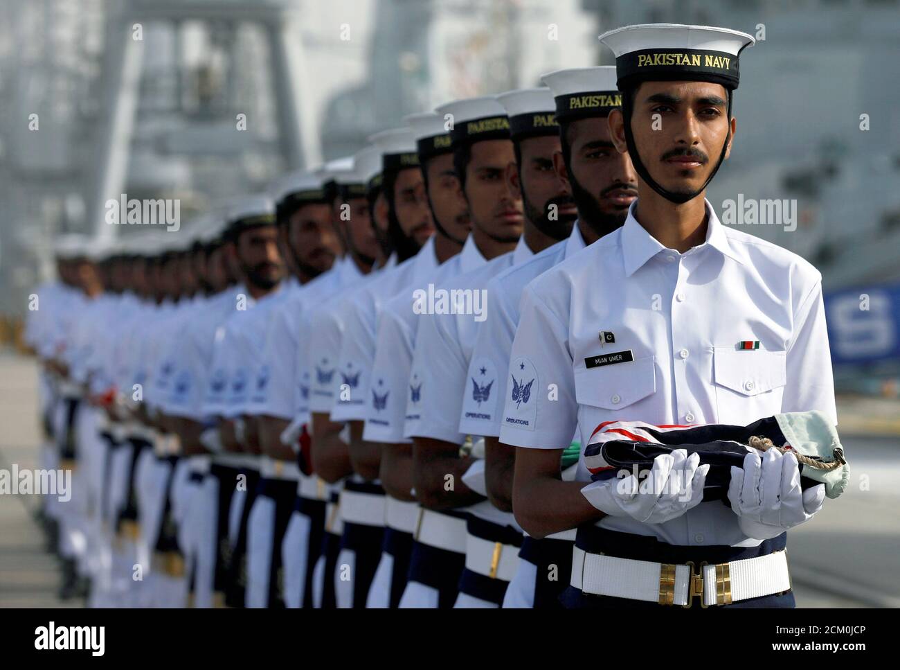Pakistan Navy's servicemen carry national flags of participating countries during the opening ceremony of Pakistan Navy's Multinational Exercise AMAN-19, in Karachi, Pakistan February 8, 2019. REUTERS/Akhtar Soomro TPX IMAGES OF THE DAY Pakistan Navy's servicemen carry national flags of participating countries during the opening ceremony of Pakistan Navy's Multinational Exercise AMAN-19, in Karachi, Pakistan February 8, 2019. REUTERS/Akhtar Soomro TPX IMAGES OF THE DAY
