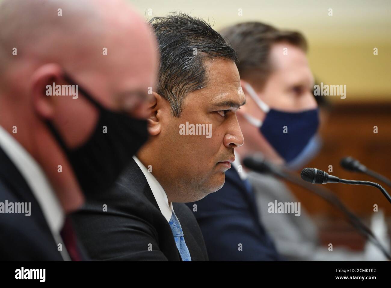 R. Clarke Cooper (L), Assistant Secretary of State for Political-Military Affairs, Brian Bulatao (C), Under Secretary of State for Management, and Marik String, Acting Legal Adviser for the State Department, testify before a House Committee on Foreign Affairs hearing looking into the firing of State Department Inspector General Steven Linick, on Capitol Hill in Washington, DC on Wednesday, September 16, 2020. Credit: Kevin Dietsch/Pool via CNP | usage worldwide Stock Photo