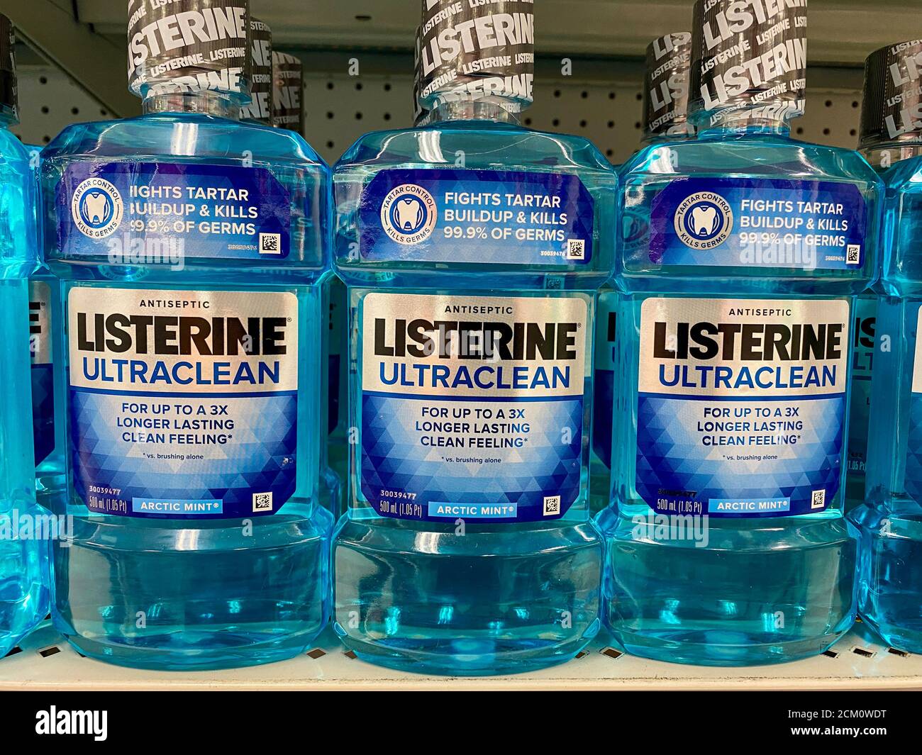Listerine mouth wash bottles on a store shelf Stock Photo