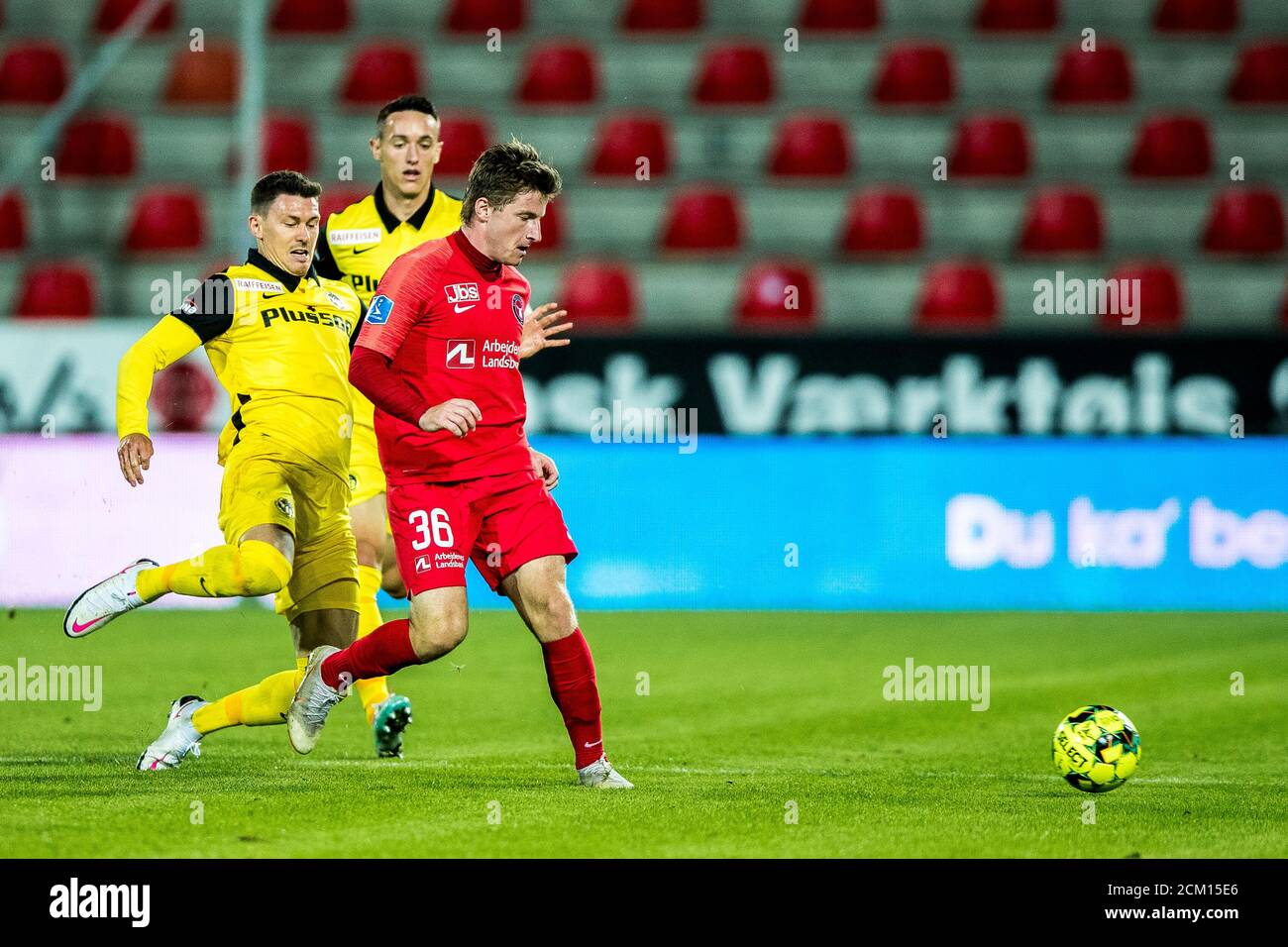 Herning, Denmark. 16th Sep, 2020. Herning, Denmark. September 16th, 2020. Anders Dreyer (36) of FC Midtjylland and Christian Fassnacht of Young Boys seen in the UEFA Champions League qualification match between FC Midtjylland and BSC Young Boys at MCH Arena in Herning. (Photo Credit: Gonzales Photo/Alamy Live News Stock Photo