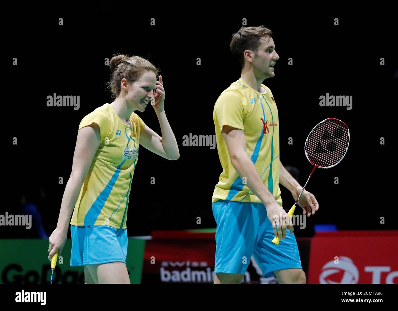 2019 Badminton World Championships - St. Jakobshalle Basel, Basel,  Switzerland - August 20, 2019 Germany's Mark Lamsfuss and Isabel Herttrich  react during their second round mixed doubles match against China's Zheng  Siwei