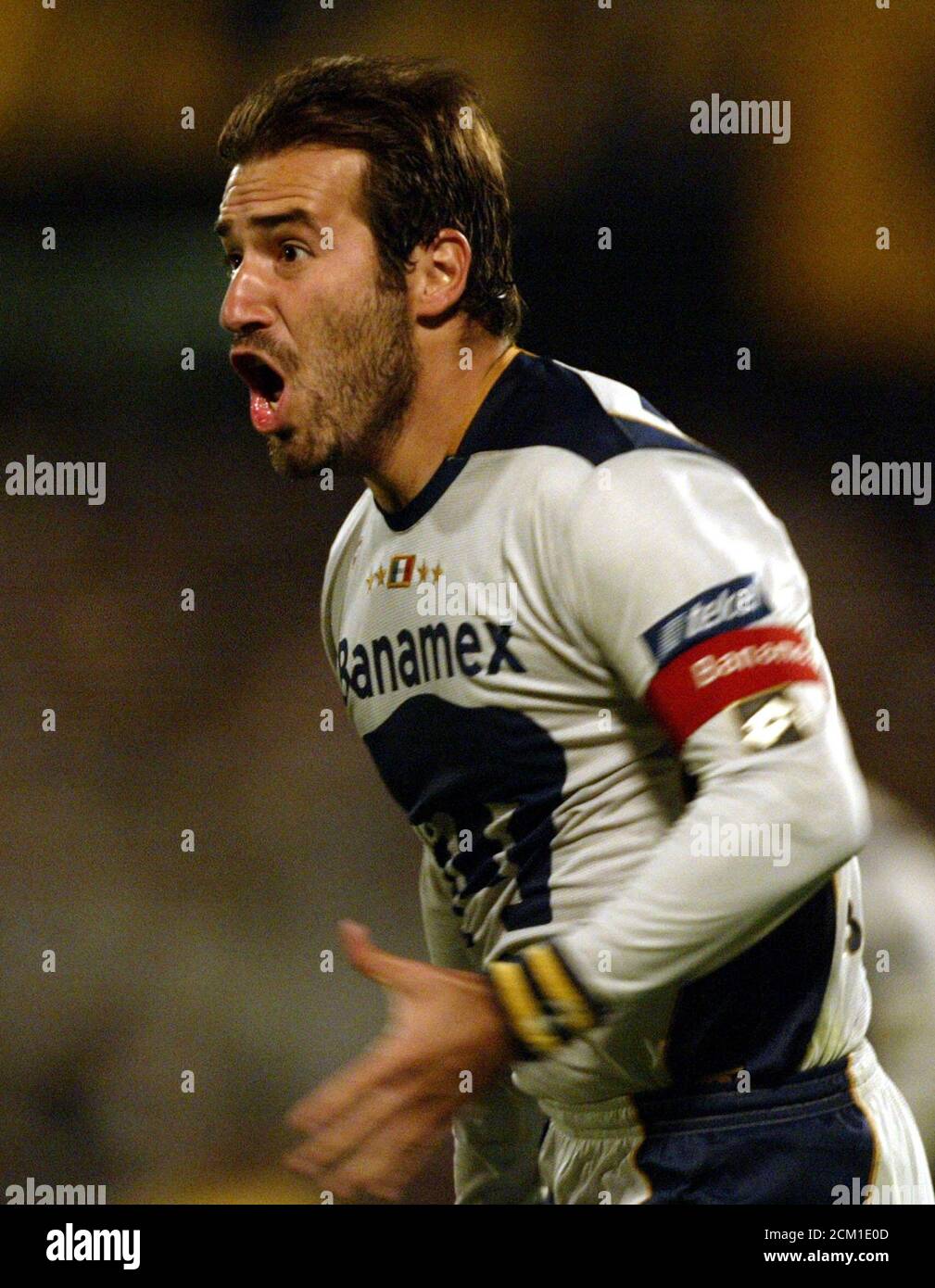 red and black adidas football boots