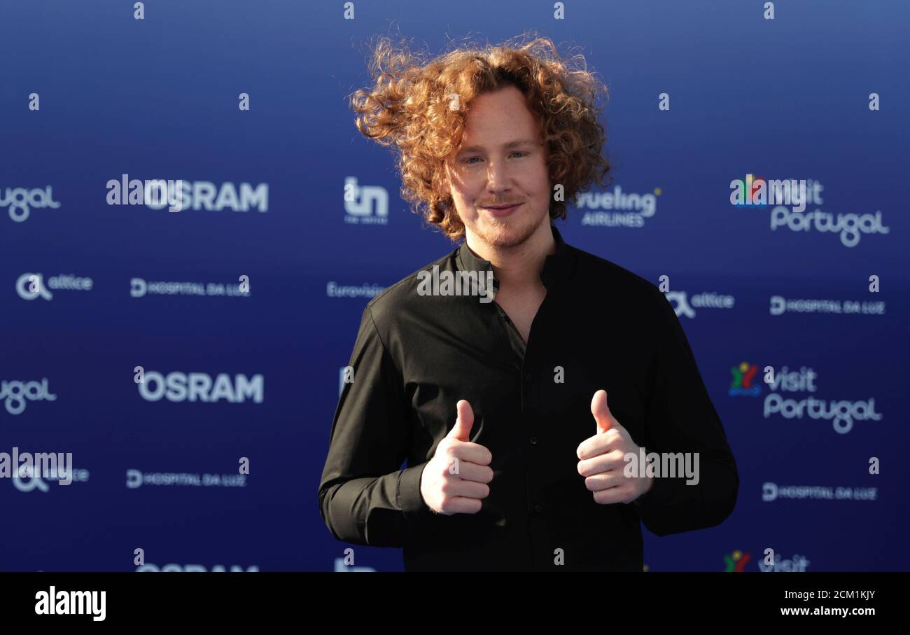 Contestant Michael Schulte of Germany poses on the blue carpet during the  opening party for Eurovision