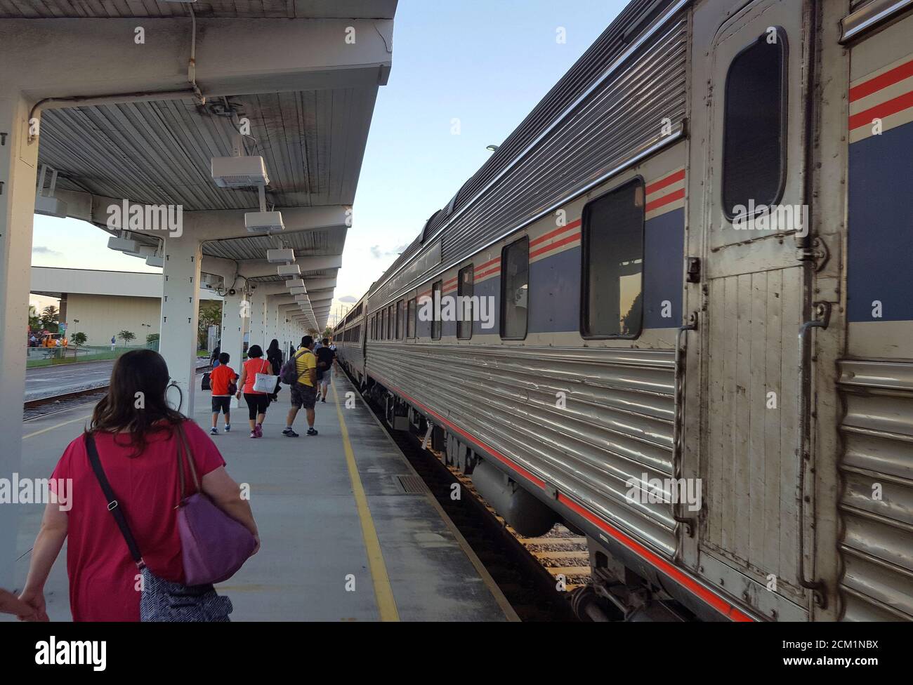 Train travelers depart a train at Miami Train Station, Miami, Florida