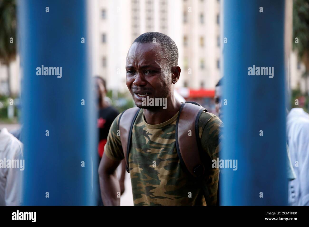 A man reacts after hearing the announcement by Congo's election board to postpone a presidential vote scheduled for Sunday by one week, outside the the Congo's National Independent Electoral Commission (CENI) building in Kinshasa, Democratic Republic of Congo, December 20, 2018. REUTERS/Baz Ratner Stock Photo