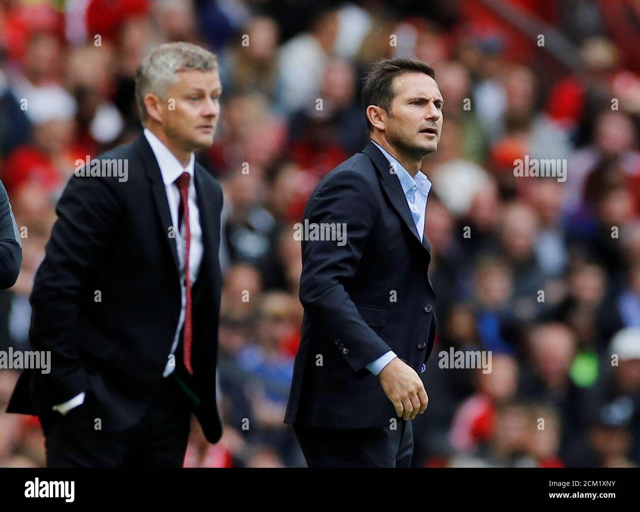 Soccer Football - Premier League - Manchester United v Chelsea - Old Trafford, Manchester, Britain - August 11, 2019  Manchester United manager Ole Gunnar Solskjaer and Chelsea manager Frank Lampard   REUTERS/Phil Noble  EDITORIAL USE ONLY. No use with unauthorized audio, video, data, fixture lists, club/league logos or 'live' services. Online in-match use limited to 75 images, no video emulation. No use in betting, games or single club/league/player publications.  Please contact your account representative for further details. Stock Photo