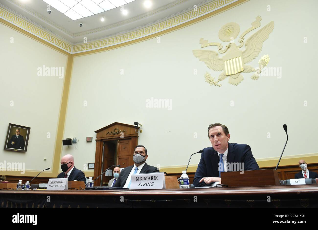 Marik String (R), Acting Legal Adviser for the State Department, testifies with R. Clarke Cooper (L), Assistant Secretary of State for Political-Military Affairs, and Brian Bulatao, Under Secretary of State for Management, during a House Committee on Foreign Affairs hearing looking into the firing of State Department Inspector General Steven Linick, on Capitol Hill in Washington, D.C. on Wednesday, September 16, 2020.   Credit: Kevin Dietsch / Pool via CNP /MediaPunch Stock Photo