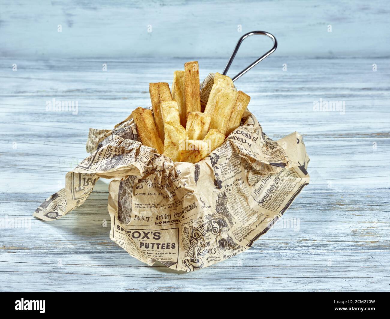 Thick cut potatoes chunky chips Stock Photo Alamy