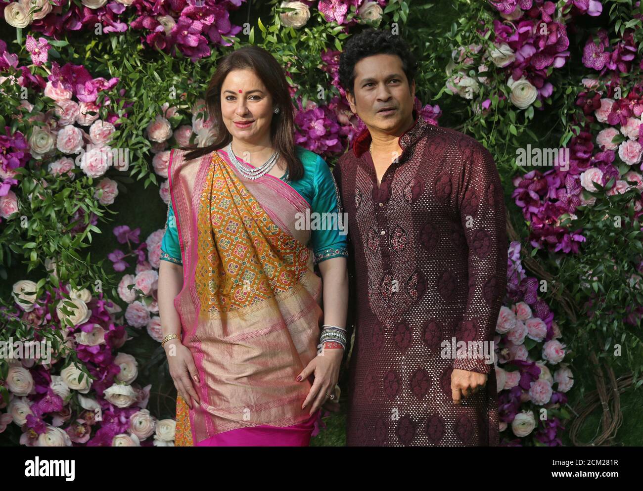 Former Indian Cricketer Sachin Tendulkar And His Wife Anjali Pose During A Photo Opportunity At The Wedding Ceremony Of Akash Ambani Son Of The Chairman Of Reliance Industries Mukesh Ambani At Bandra Kurla