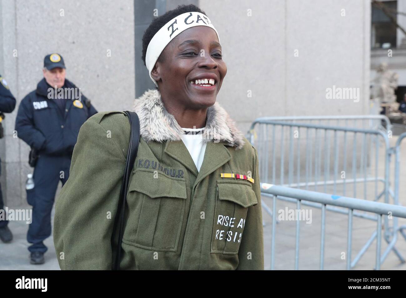 Therese Patricia Okoumou smiles after her sentencing for conviction on attempted scaling of the Statue of Liberty to protest the U.S. immigration policy, outside a federal court in New York, U.S., March 19, 2019. REUTERS/Shannon Stapleton Stock Photo