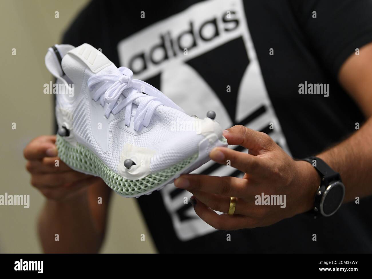 The Adidas shoe Alphaedge with a Elastomer mid-sole from a 3D printer is  presented during celebrations for German sports apparel maker Adidas' 70th  anniversary at the company's FutureLab in Herzogenaurach, Germany, August
