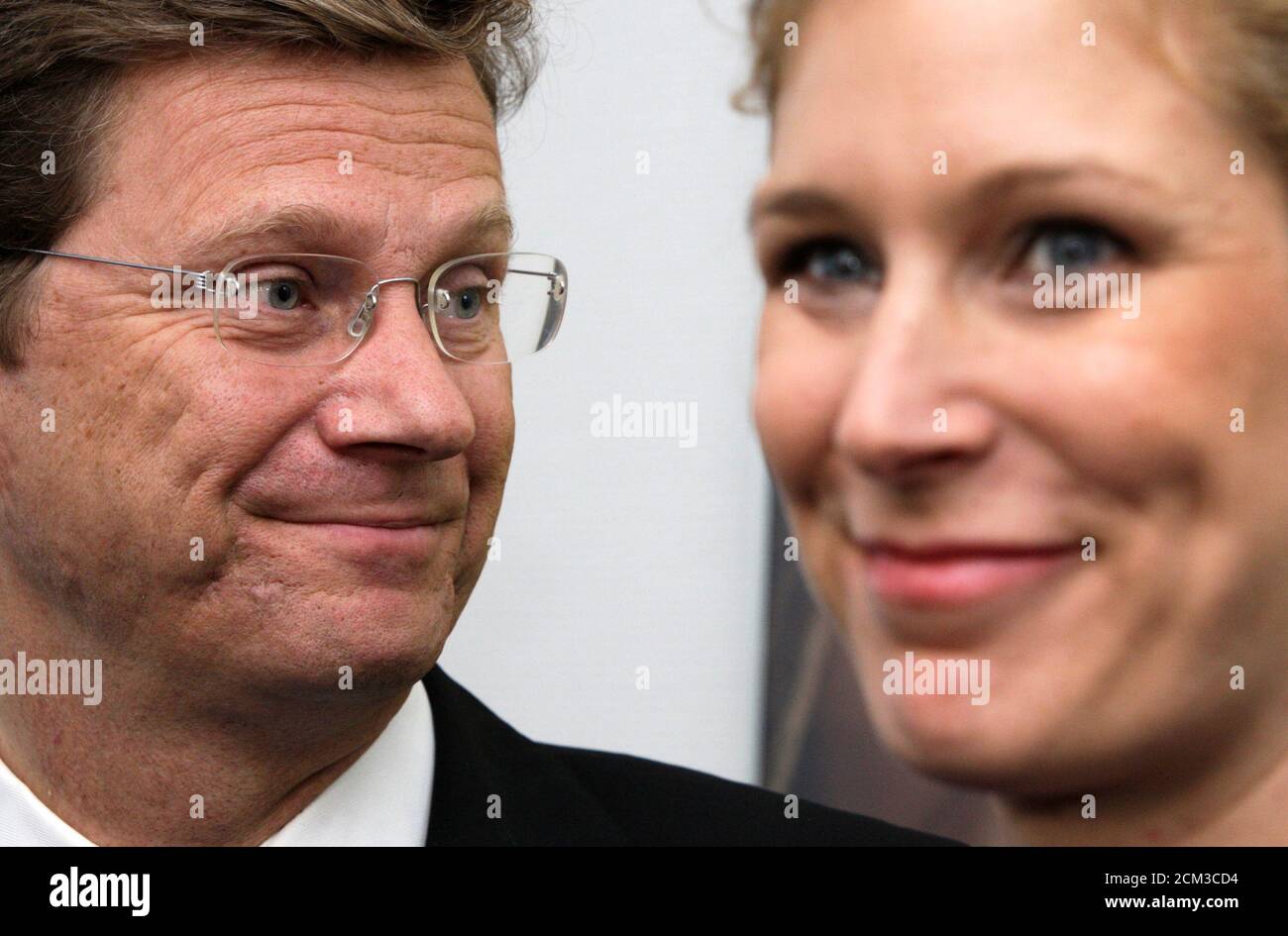 Free Democratic Party (FDP) party leader Guido Westerwelle (L) and his party's top EU candidate Silvana Koch-Mehrin attend a news briefing on the results of the European Parliament elections in the FDP party headquarters in Berlin June 8, 2009.  REUTERS/Thomas Peter  (GERMANY POLITICS ELECTIONS) Stock Photo