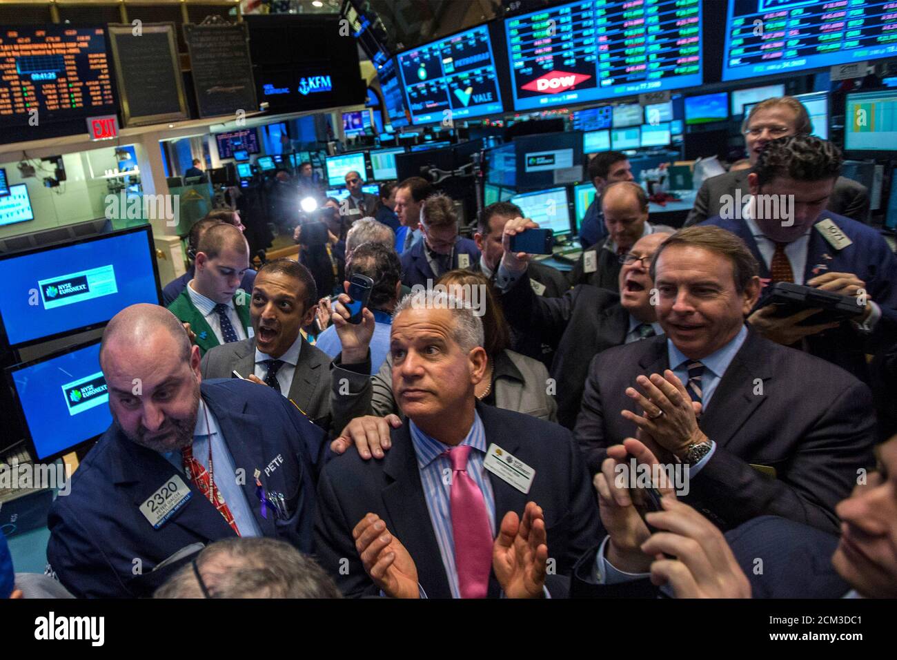 Fidelity & Guaranty Life President and CEO Lee Launer (R) celebrates his company's IPO on the floor of the New York Stock Exchange December 13, 2013. Shares of the insurer, controlled by billionaire Philip Falcone's Harbinger Group Inc, rose as much as 12 percent in their market debut, valuing the company at about $1.07 billion.REUTERS/Brendan McDermid (UNITED STATES - Tags: BUSINESS) Stock Photo