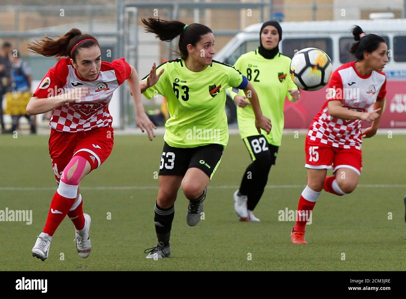 Players of Shabab Al-Ordon Club fight for the ball with Al Ahli Club  players during their Jordan Women's Pro League soccer match in Amman, Jordan,  June 8, 2019.REUTERS/Muhammad Hamed Stock Photo -