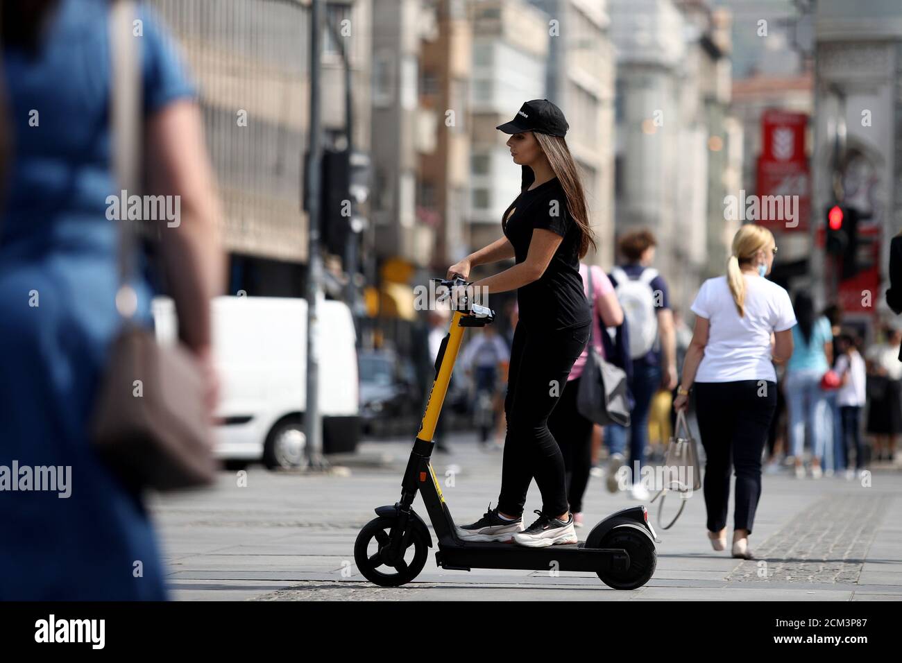 Sarajevo, Bosnia and Herzegovina (BiH). 16th Sep, 2020. A woman is seen on  an electric scooter in Sarajevo, Bosnia and Herzegovina (BiH), on Sept. 16,  2020. A new way to move around
