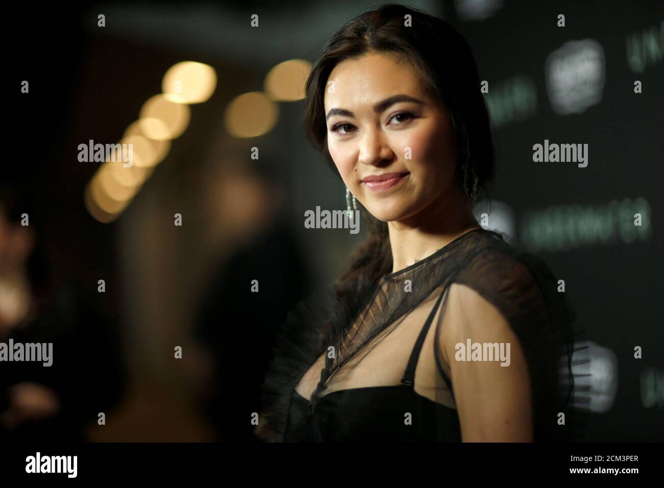 Cast member Jessica Henwick poses at a screening for the film