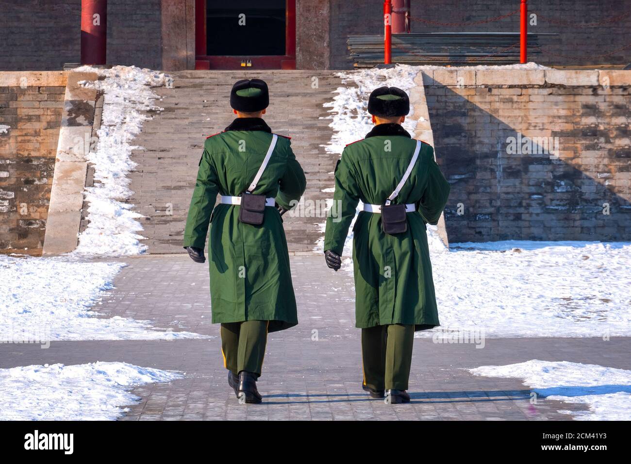 Beijing, China - Jan 9 2020: Unidentified Chinese military officer march through courtyard in front of the Taihedian (Hall of Supreme Harmony) at the Stock Photo