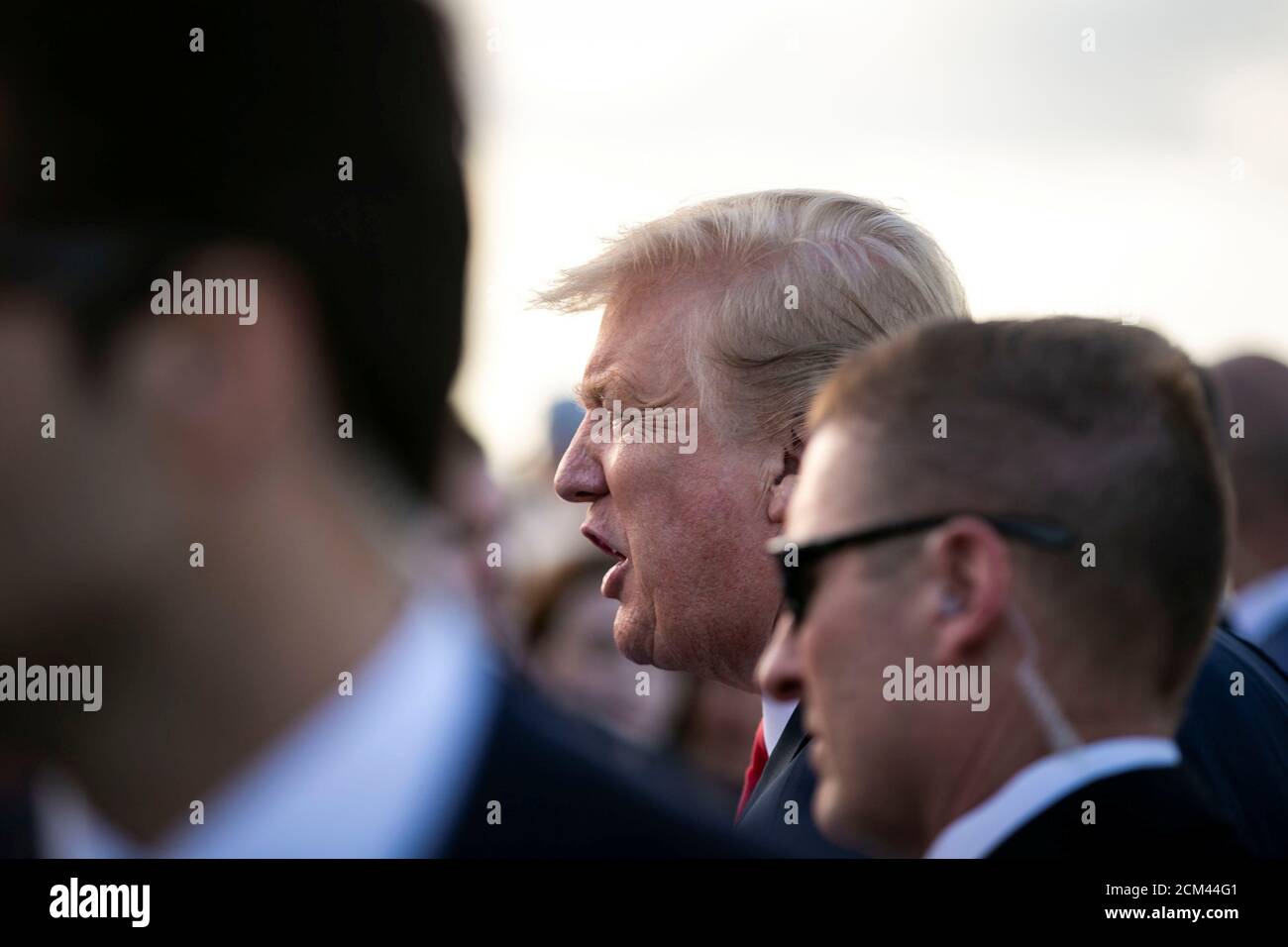 U.S. President Donald Trump greets supporters on the tarmac at Palm Beach International Airport, as he arrives to spend Easter weekend at his Mar-a-Lago club, Florida, U.S., April 18, 2019. REUTERS/Al Drago Stock Photo