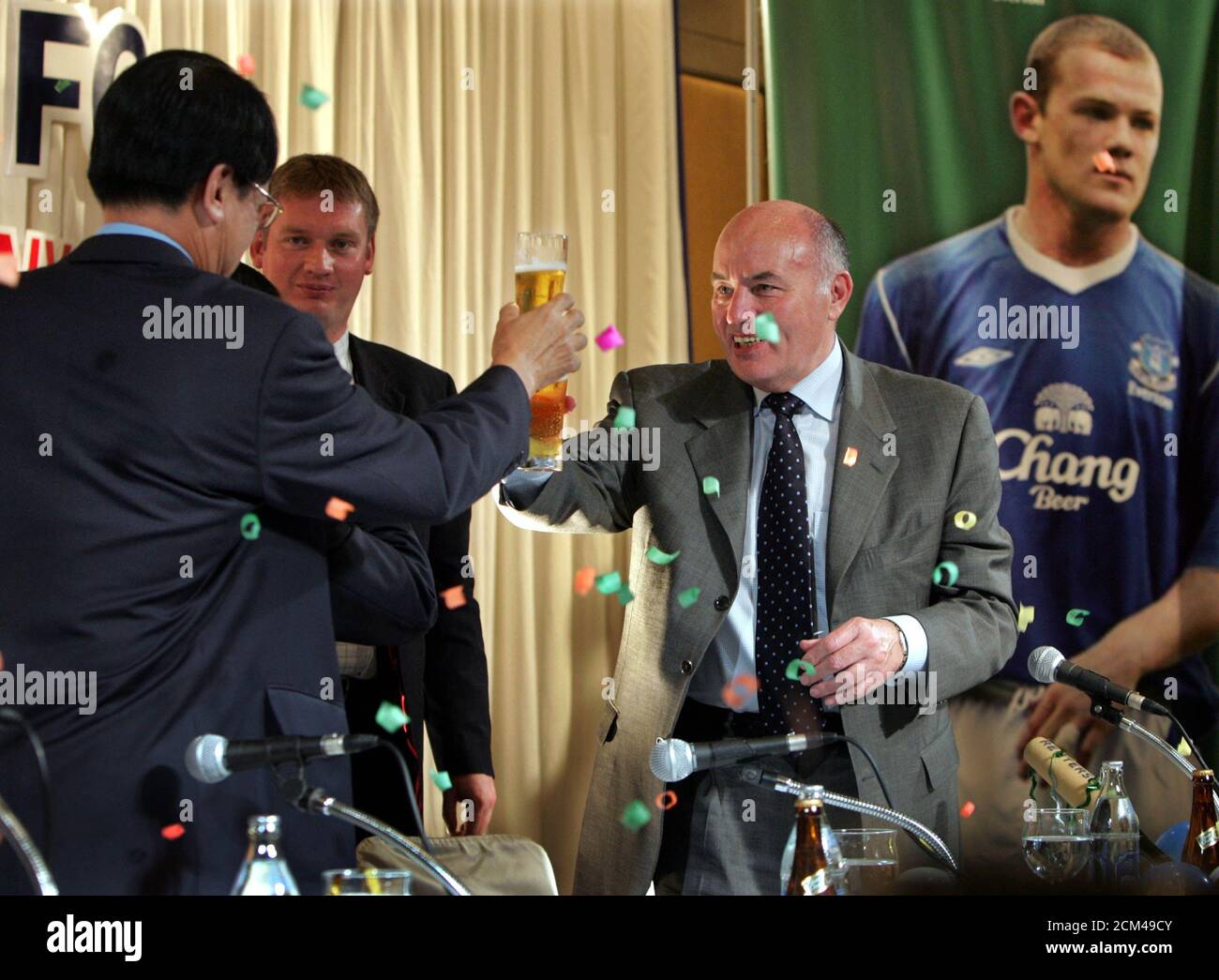 EVERTONS FOOTBALL CLUB DIRECTOR PAUL GREGG TOASTS WITH REPRESENTATIVES