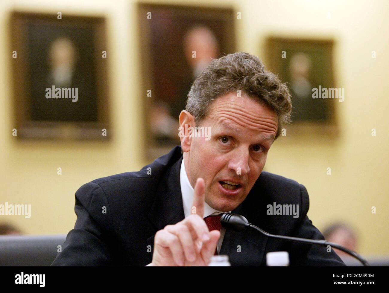 U.S. Treasury Secretary Timothy Geithner testifies about the Obama administration's budget proposals and goals for economic recovery and reform before the House Appropriations Subcommittee on General Government and Financial Services on Capitol Hill in Washington, May 21, 2009. Geithner said that a bailout for banks was steadying the financial system but care must be taken to ensure that normal market forces are allowed to operate.  REUTERS/Jim Bourg   (UNITED STATES POLITICS BUSINESS) Stock Photo