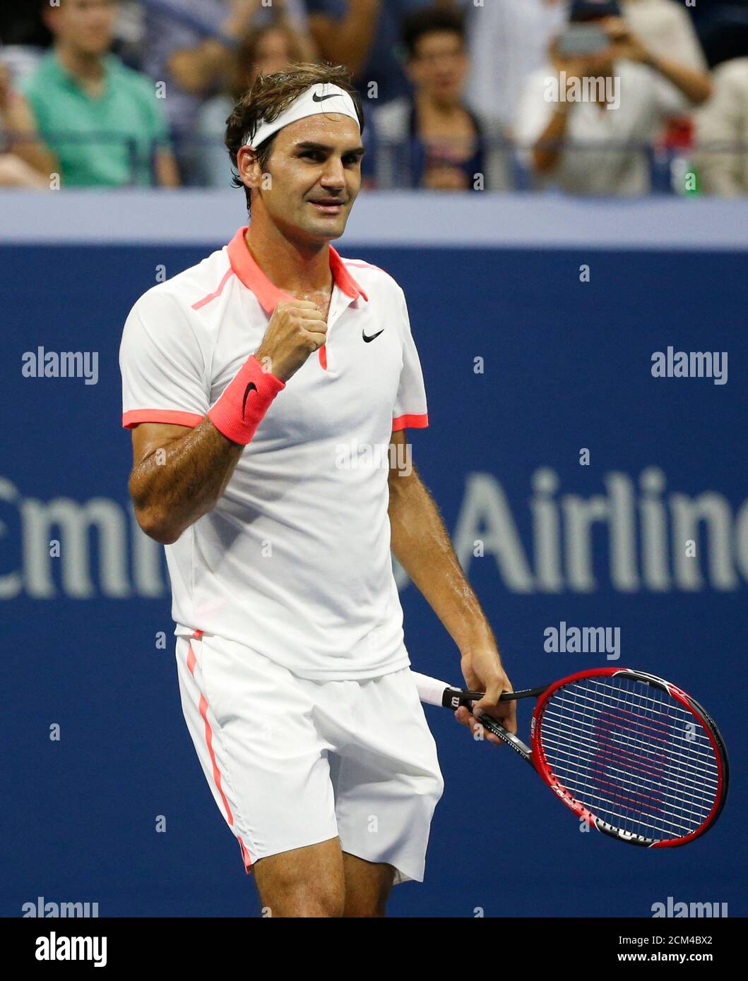 Roger Federer of Switzerland celebrates match point against compatriot Stan  Wawrinka during their men's singles semi-final match at the U.S. Open  Championships tennis tournament in New York, September 11, 2015.  REUTERS/Shannon Stapleton