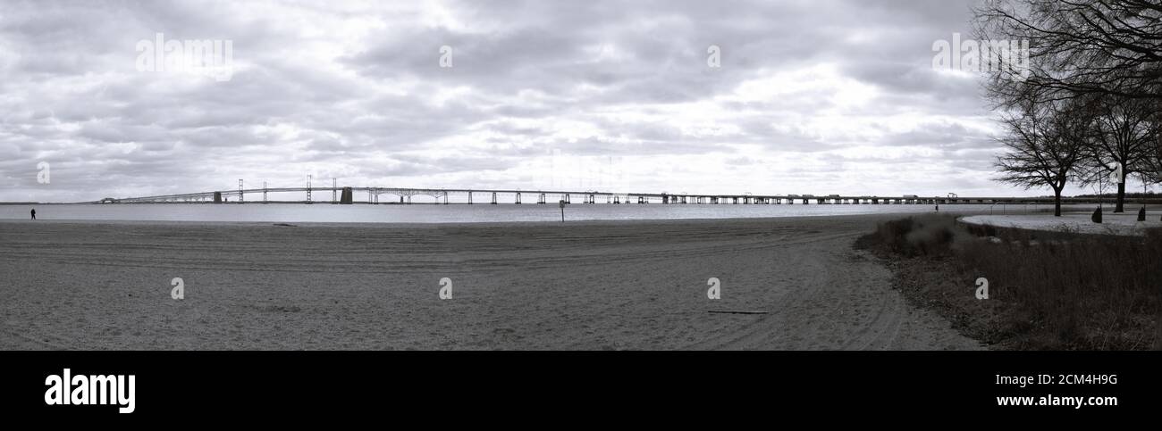 Black and white view of Chesapeake Bay Bridge as seen from the Sandy Point State Park in Maryland USA. Stock Photo