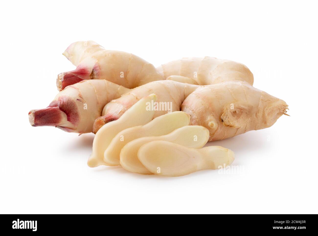 Fresh ginger and sliced fresh ginger on a white background Stock Photo