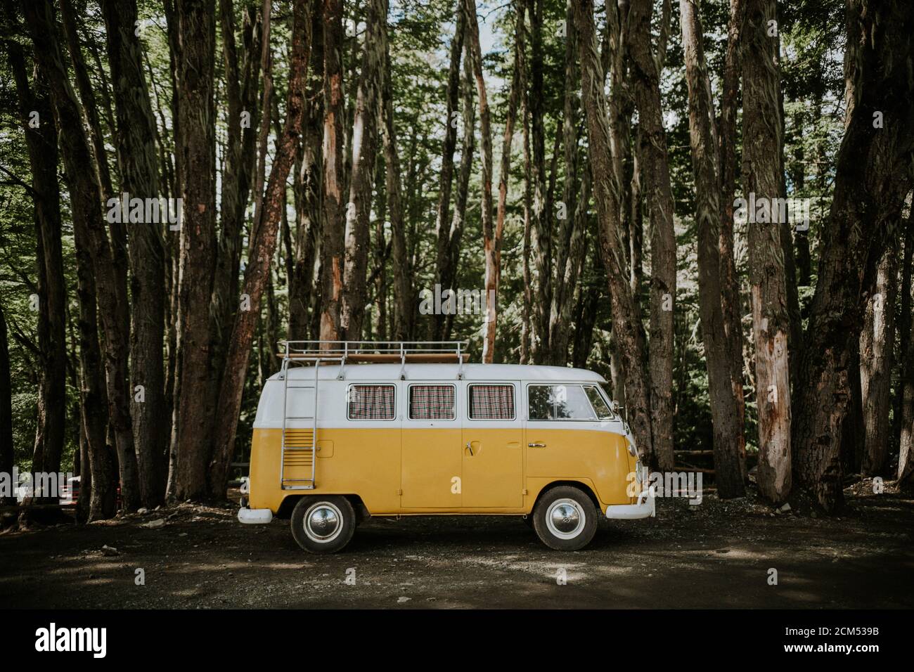 Yellow hippie kombi - Volkswagen Type 2 camper Stock Photo