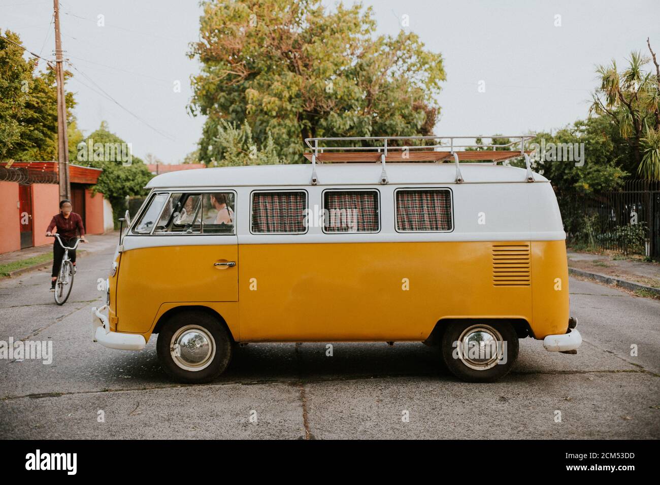 Yellow hippie kombi - Volkswagen Type 2 camper Stock Photo