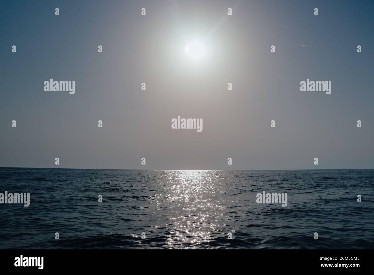 Deep bue simple sea horizon with clean sky seascape view in horizontal Stock Photo