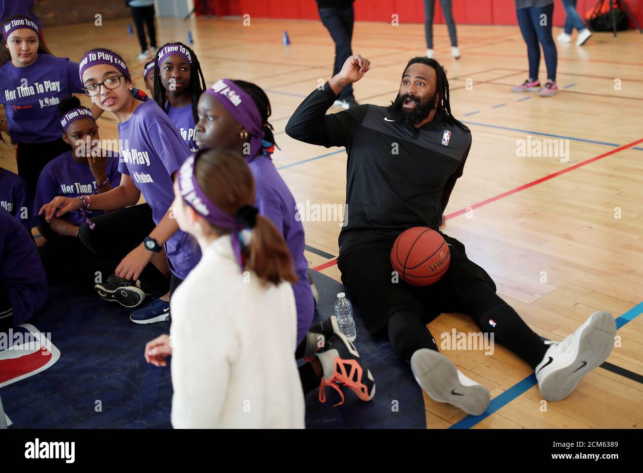 Former NBA basketball player Ronny Turiaf gestures during a clinic event  entitled Jr. NBA Girls Day "
