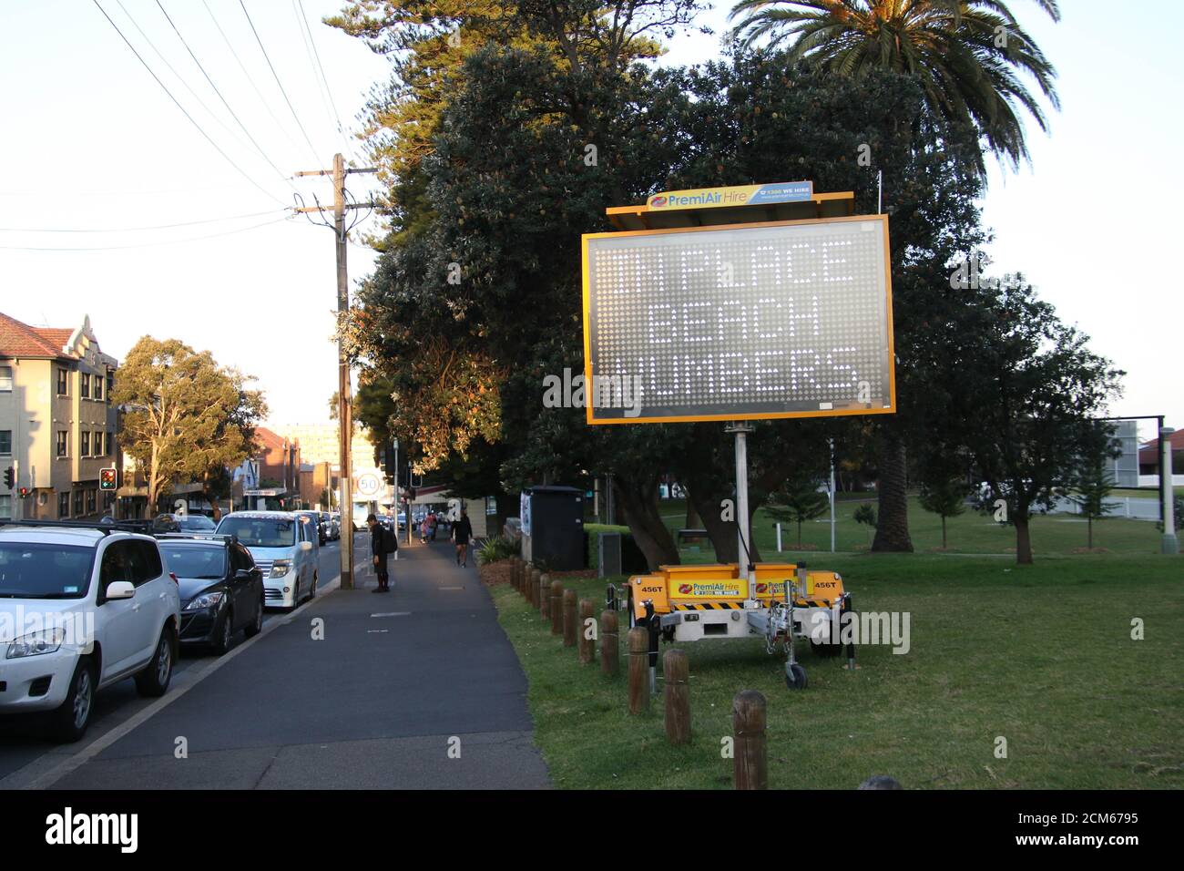 Public Health Order sign on Bondi Road indicating a maximum of 20 people are allowed at outdoor gatherings. Stock Photo