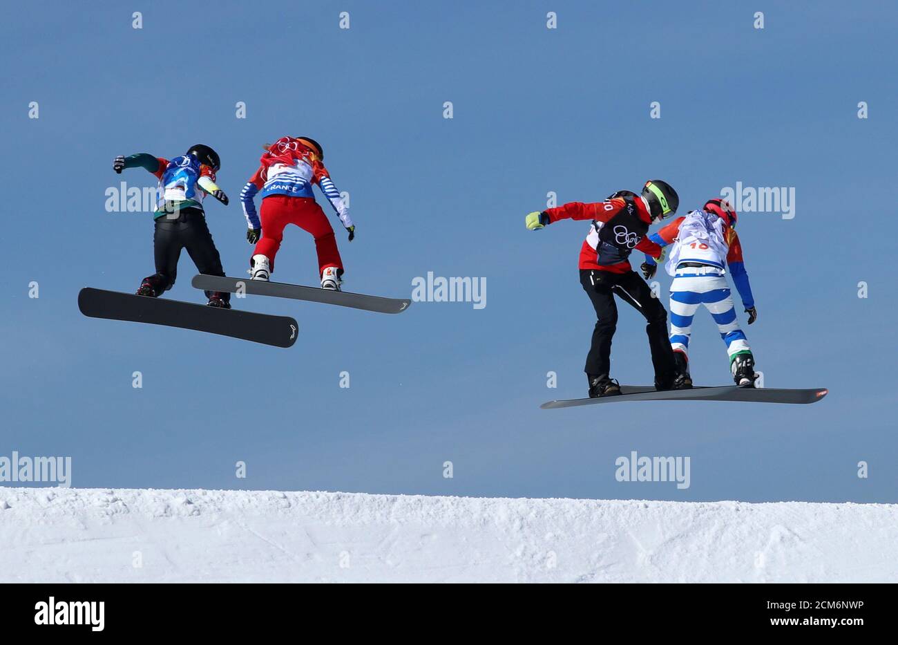 Snowboarding – Pyeongchang 2018 Winter Olympics – Women's Snowboard Cross Finals – Phoenix Snow Park – Pyeongchang, South Korea – February 16, 2018 - Raffaella Brutto of Italy competes with Tess Critchlow of Canada, Charlotte Bankes of France and Belle Brockhoff of Australia. REUTERS/Mike Blake Stock Photo