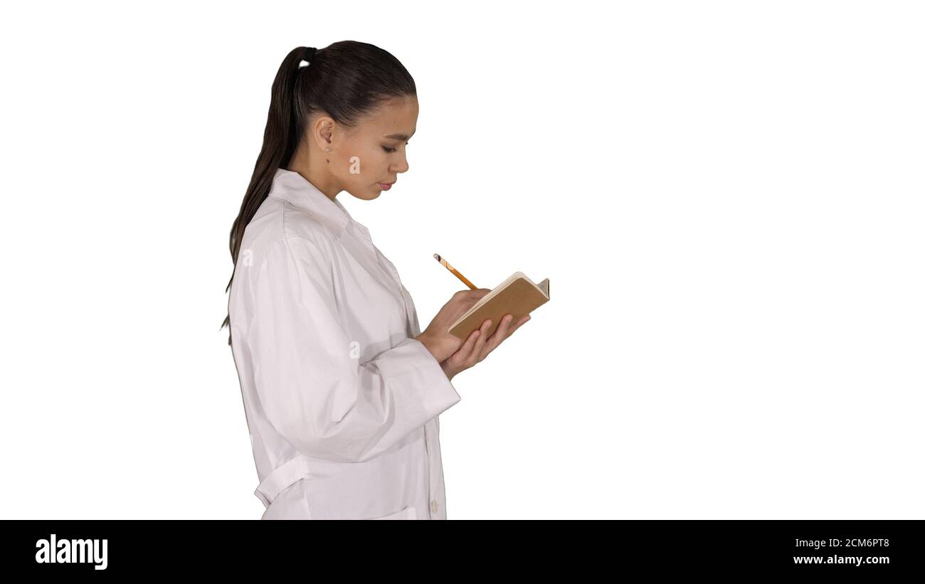 Successful medical doctors making notes while walking on white b Stock Photo