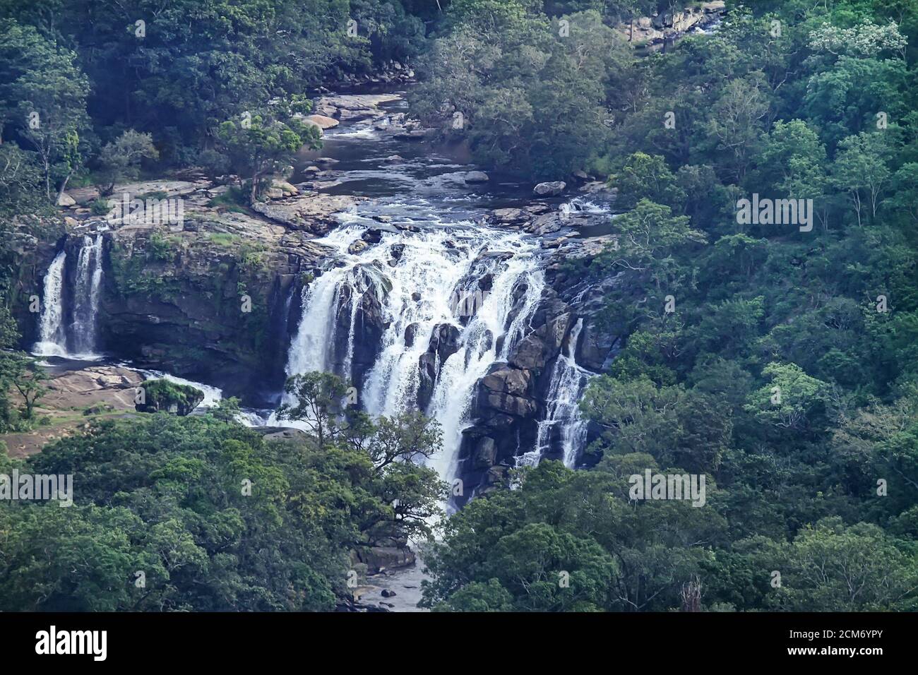 Beautiful Munnar travel photos, women workers in tea plantations, Munnar waterfall, Thoovanam waterfall, Stock Photo