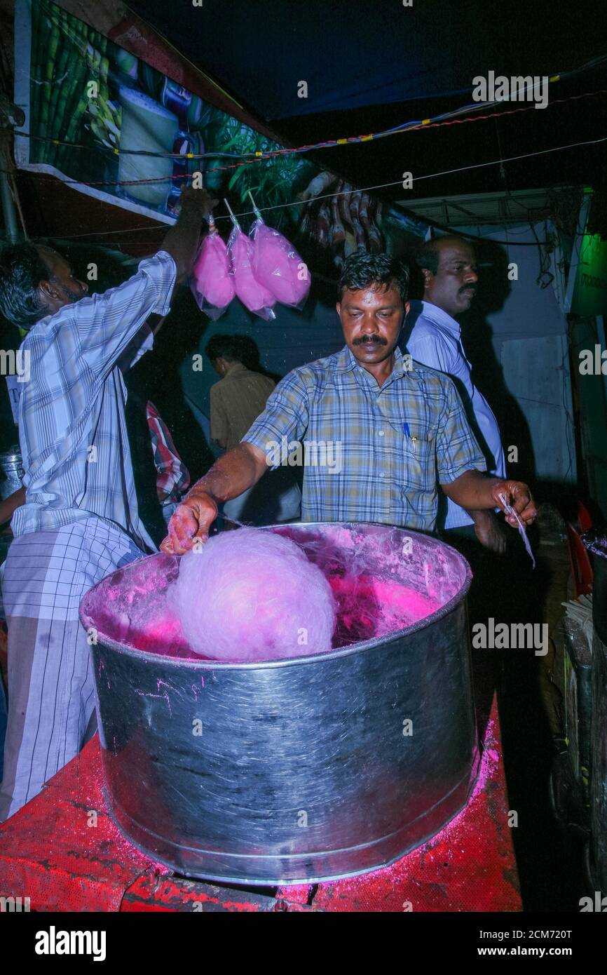 Tamilnadu local market travel photography, pink cotton candy in stick, Cotton candy Bonbon Sugar Candy cane Stock Photo