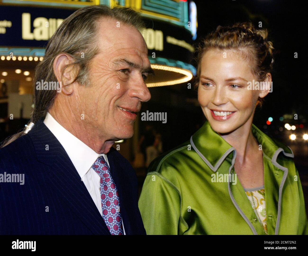 Actor Tommy Lee Jones, sporting a pony tail, and co-star actress Connie  Nielson pose together at the premiere of their new psychological thriller  film 