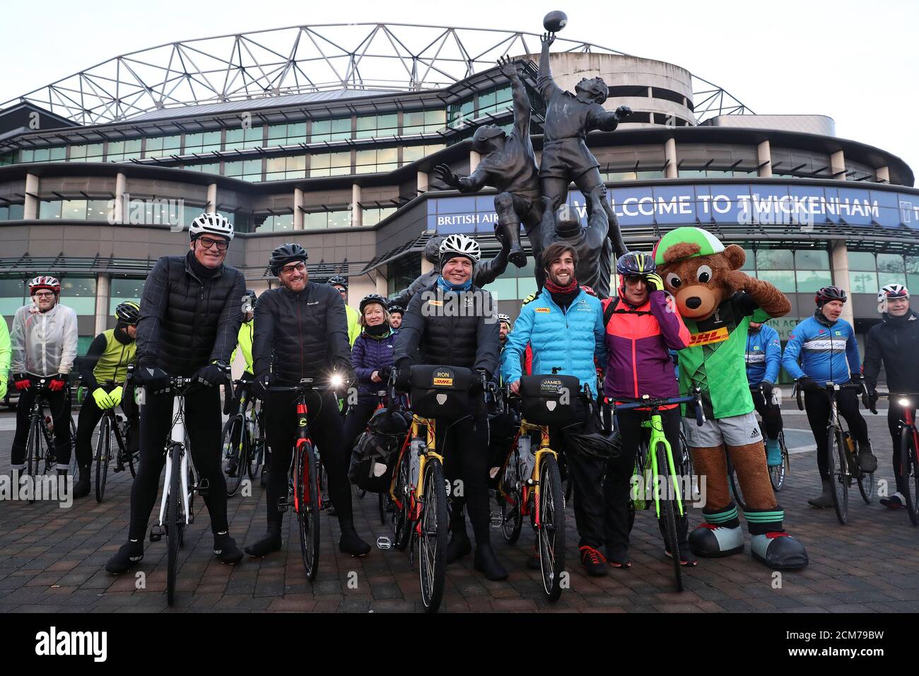 Former rugby player Ron Rutland and James Owens pose for a photograph