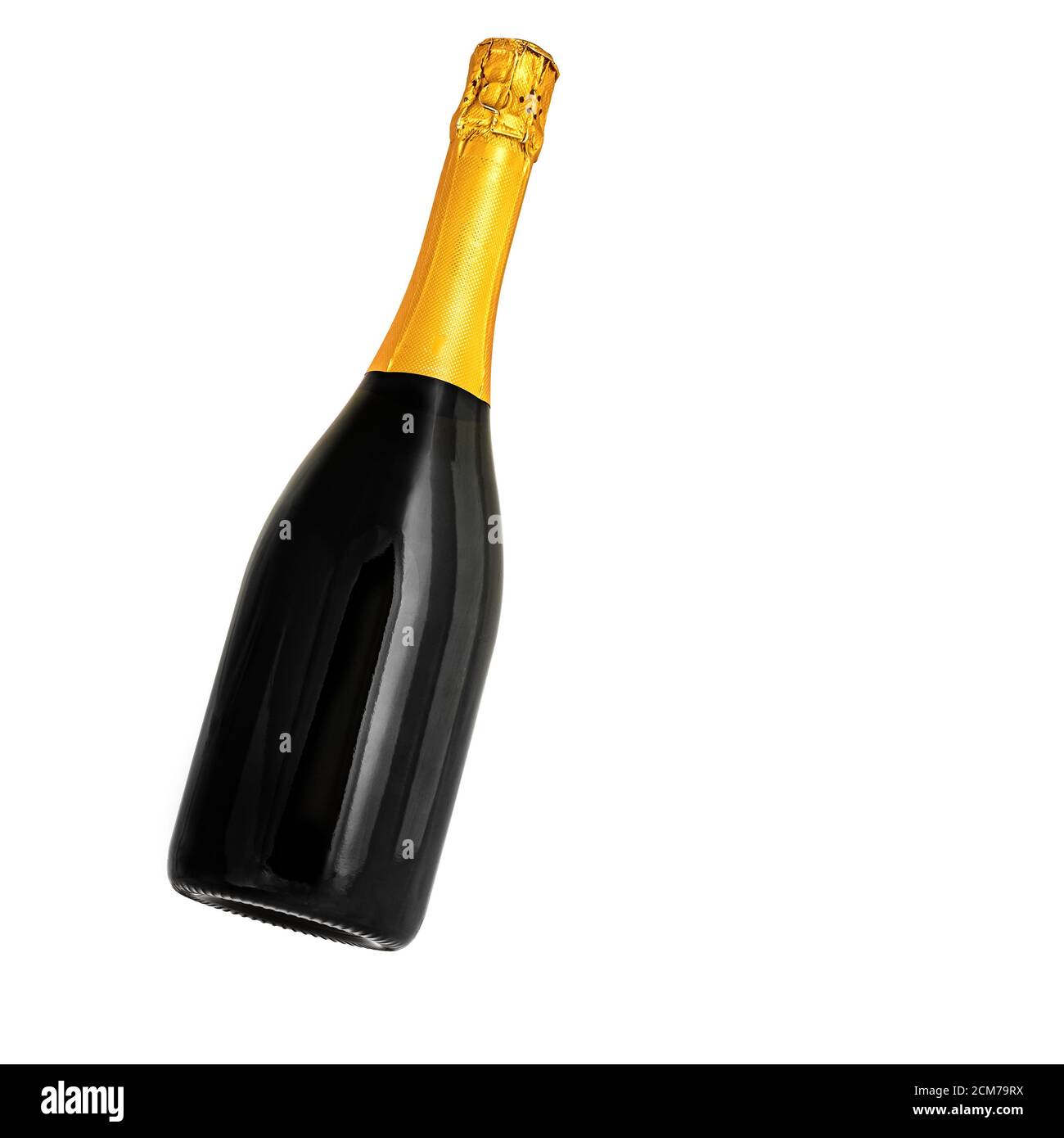 Champagne bottle isolated on a white background, dark glass, gold foil Stock Photo