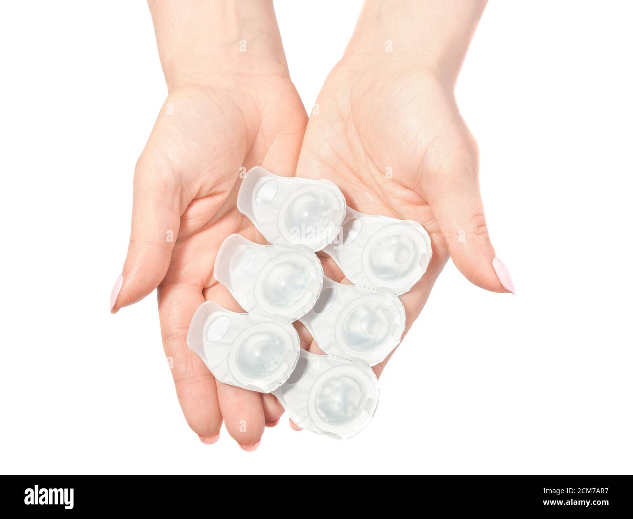 contact lenses in hands, lens packaging, concept, isolated on white