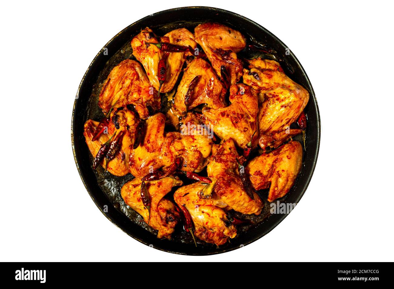 Plate of delicious barbecue chicken wings, top view, isolated