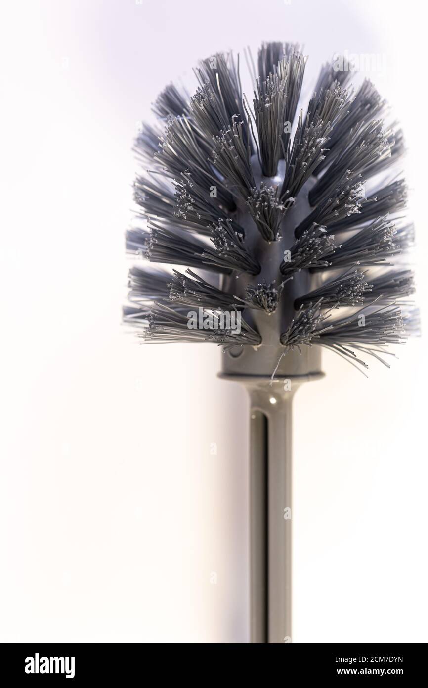 Detail of a new gray plastic toilet brush - copy space Stock Photo
