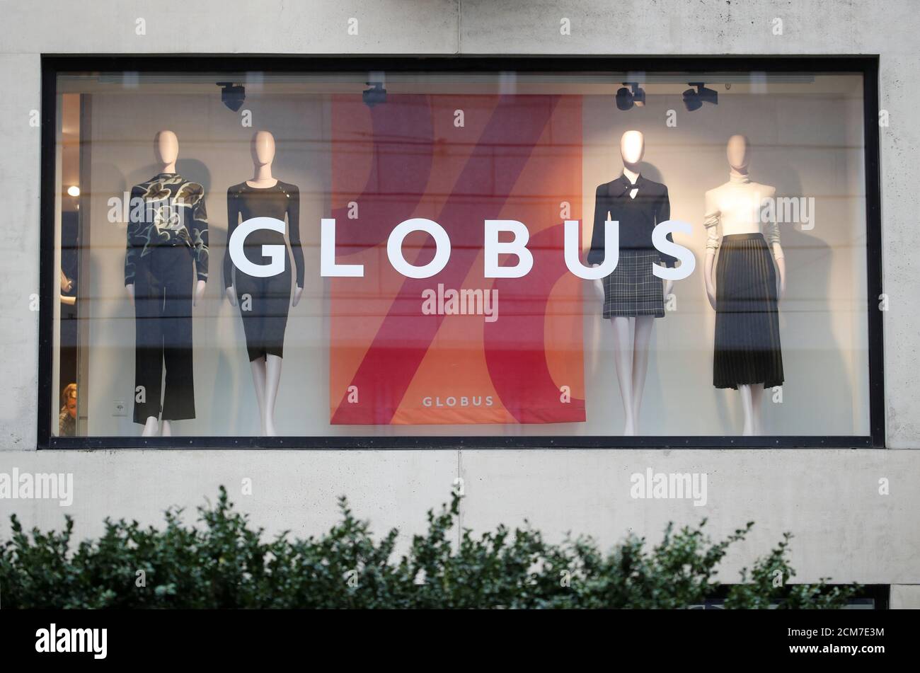 Dummies stand in a window of a Globus fashion store in Zurich