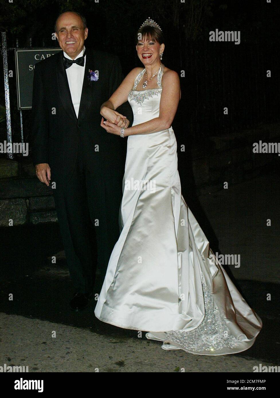 Former New York Mayor Rudy Giuliani and his bride Judith Nathan pose